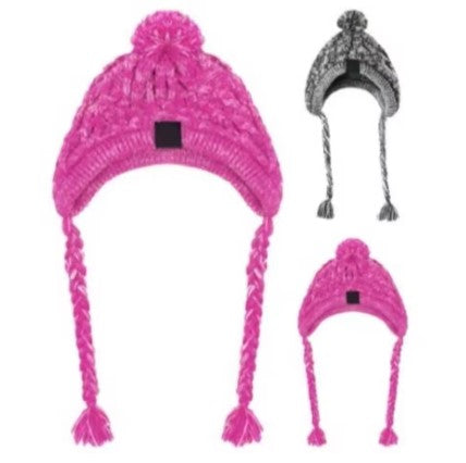 Pink knitted hat with braided earflaps and pom-pom on a white background