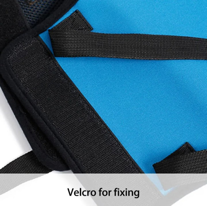 Close-up of a blue bag with black velcro straps on a white background