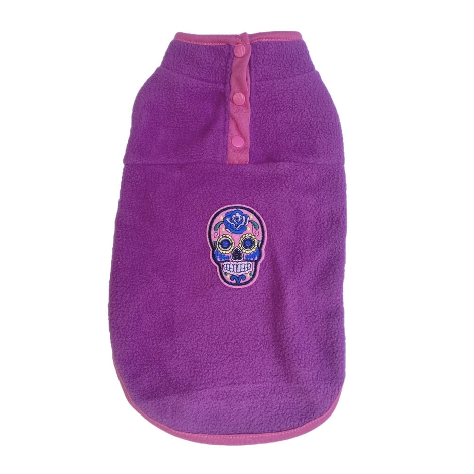 Purple fleece pet coat with a colorful skull design on a white background