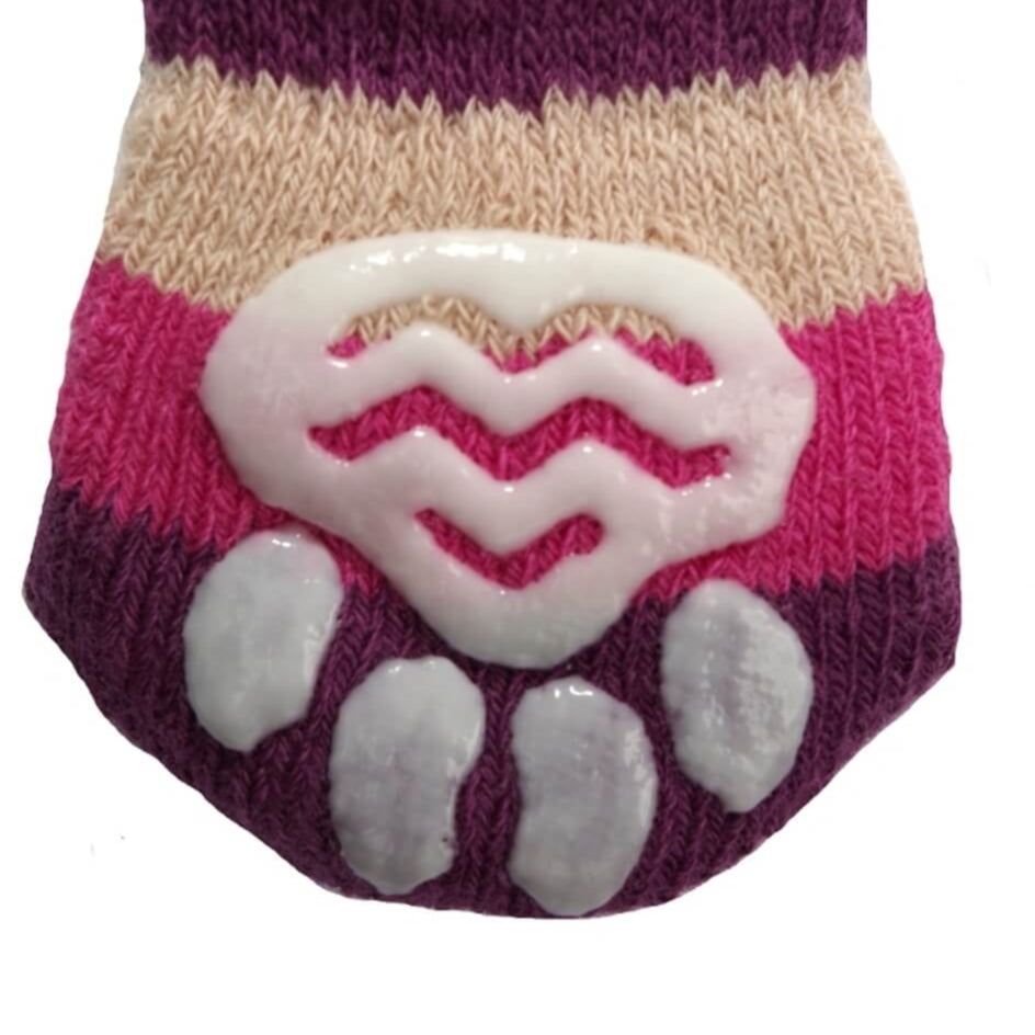 Knitted pet sock with paw print design on a white background