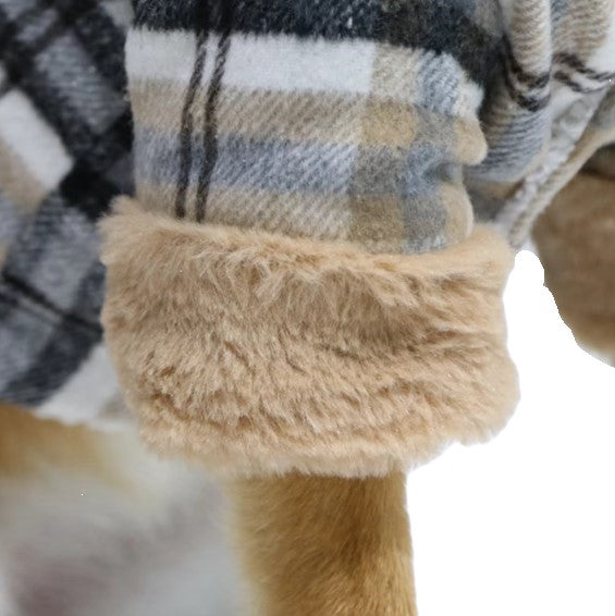 Close-up of a plaid-patterned dog sweater with fluffy trim on a white background