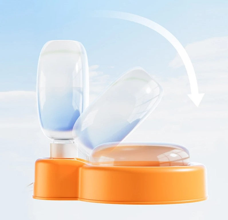 Clear plastic object with orange base on a light blue background