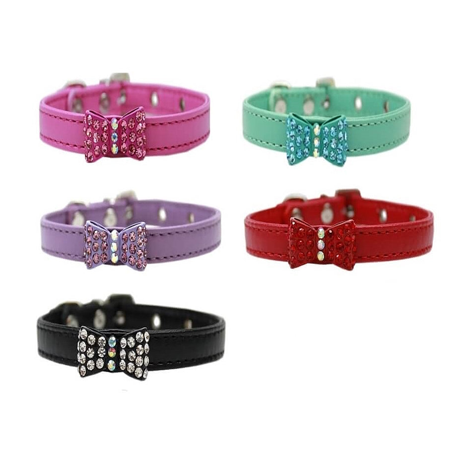 Set of five colorful dog collars with decorative bows on a white background