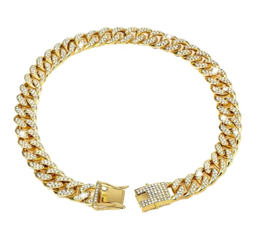 Gold bracelet with diamond accents on a white background