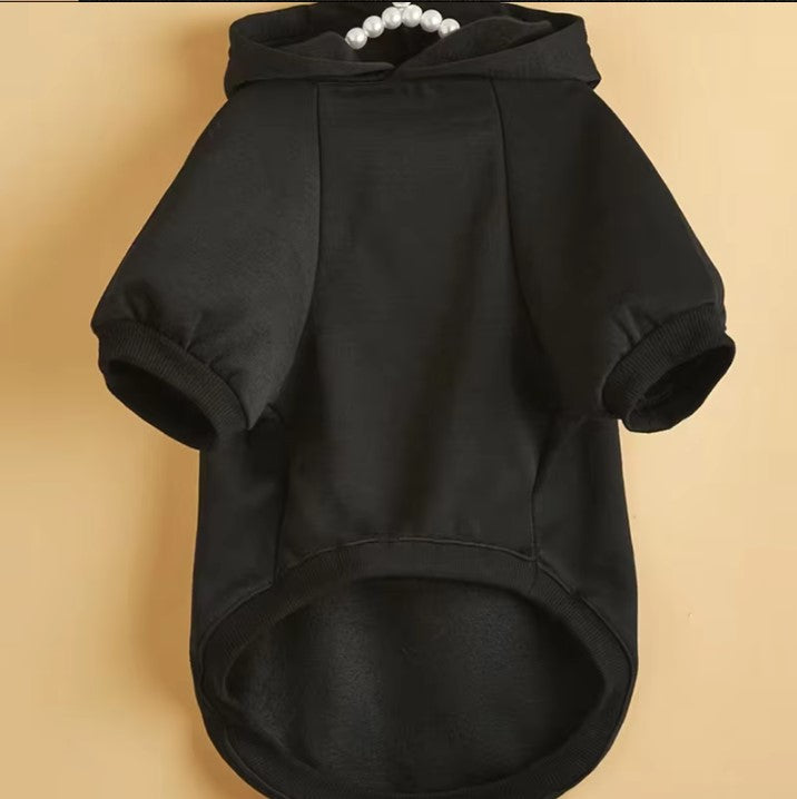 dog Black hoodie on a beige background