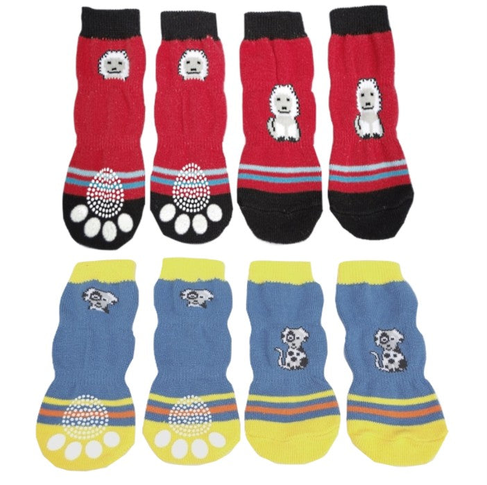 Set of red and blue pet socks with paw designs on a white background