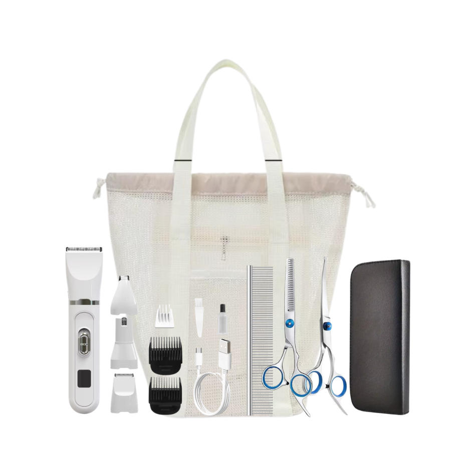 Set of grooming tools including a hair clipper, comb, scissors, and other items displayed in front of a white tote bag.