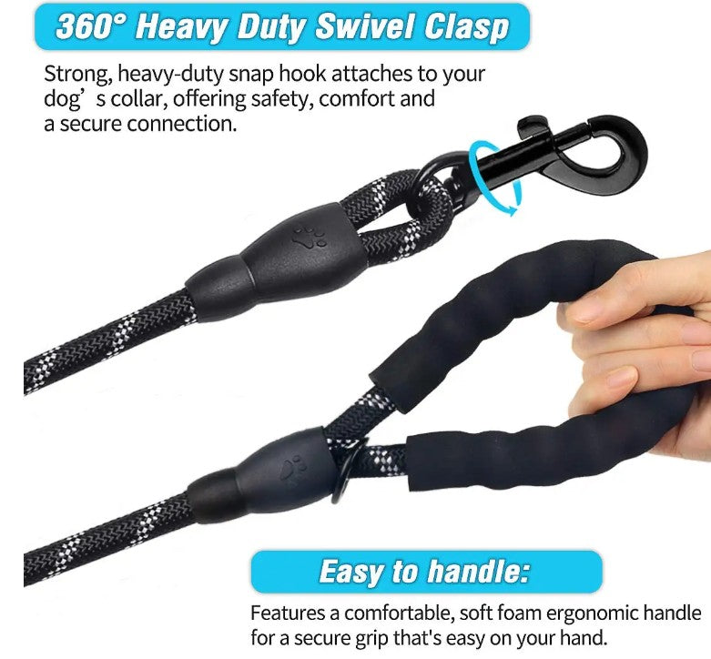 Black dog leash with 360-degree heavy-duty swivel clasp and ergonomic handle, held by a hand.